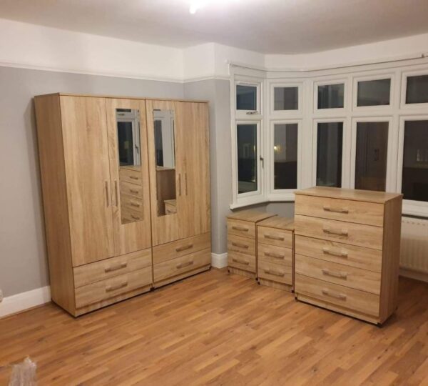 Oak Ready Assembled 4 Door Wardrobe With 2 Mirrors With Chest Drawer and 2 Bedside Cabinets